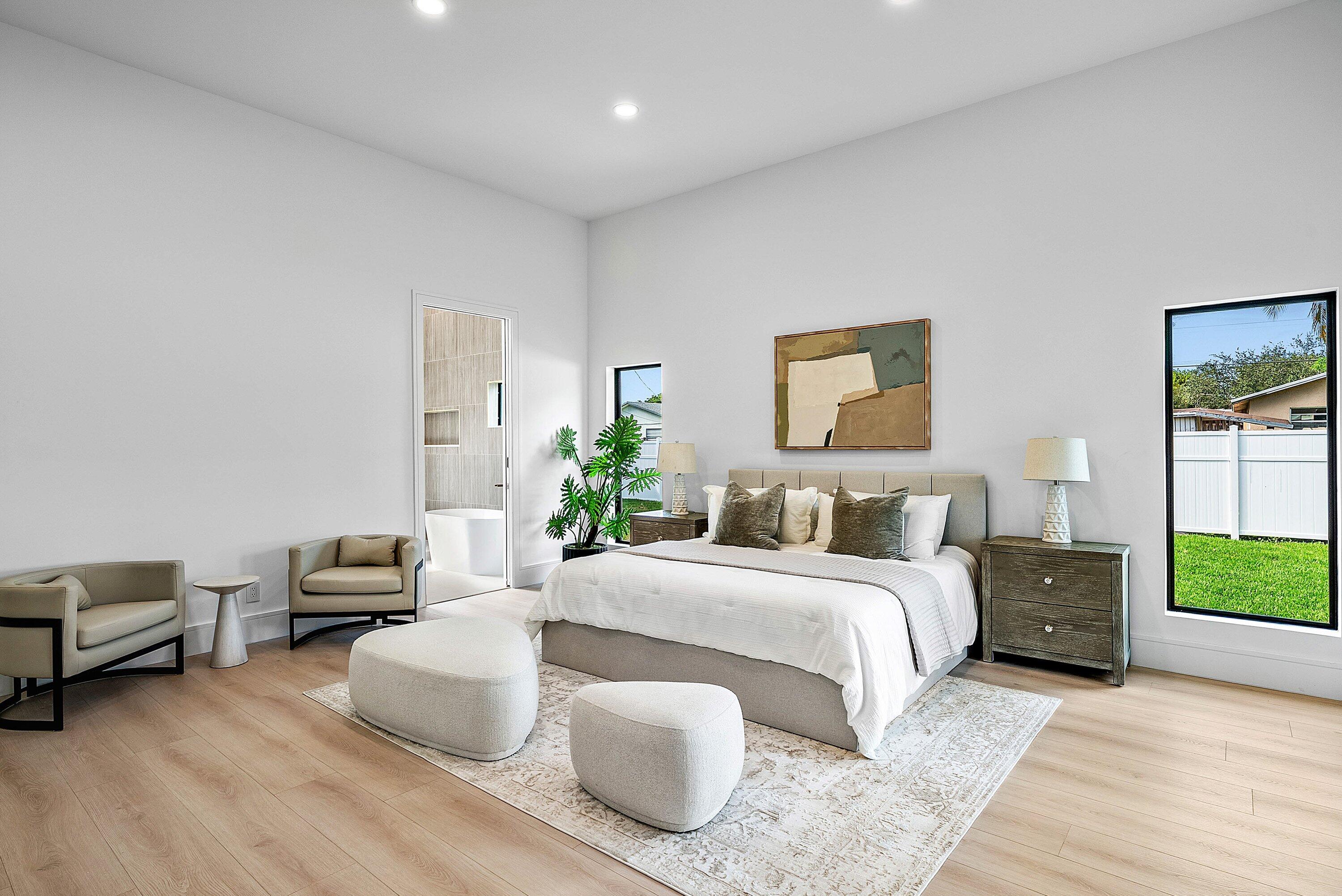 3361 Northeast 4th Avenue Boca Raton, FL 33431 - Photo 17 of 44 a bedroom with a bed and window