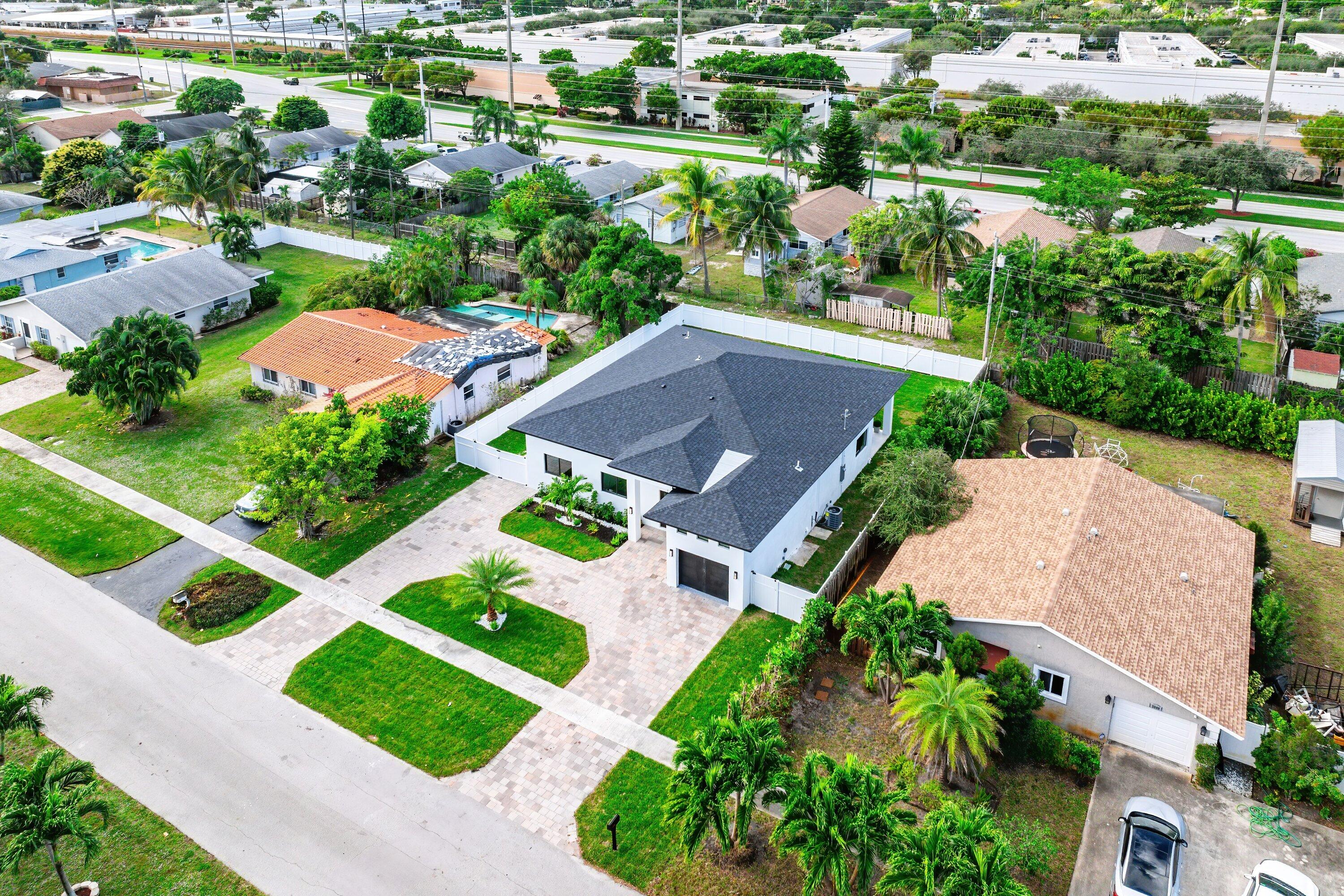 3361 Northeast 4th Avenue Boca Raton, FL 33431 - Photo 32 of 44 an aerial view of a house with garden space and street view