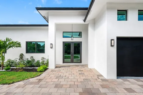 a front view of a house with a porch