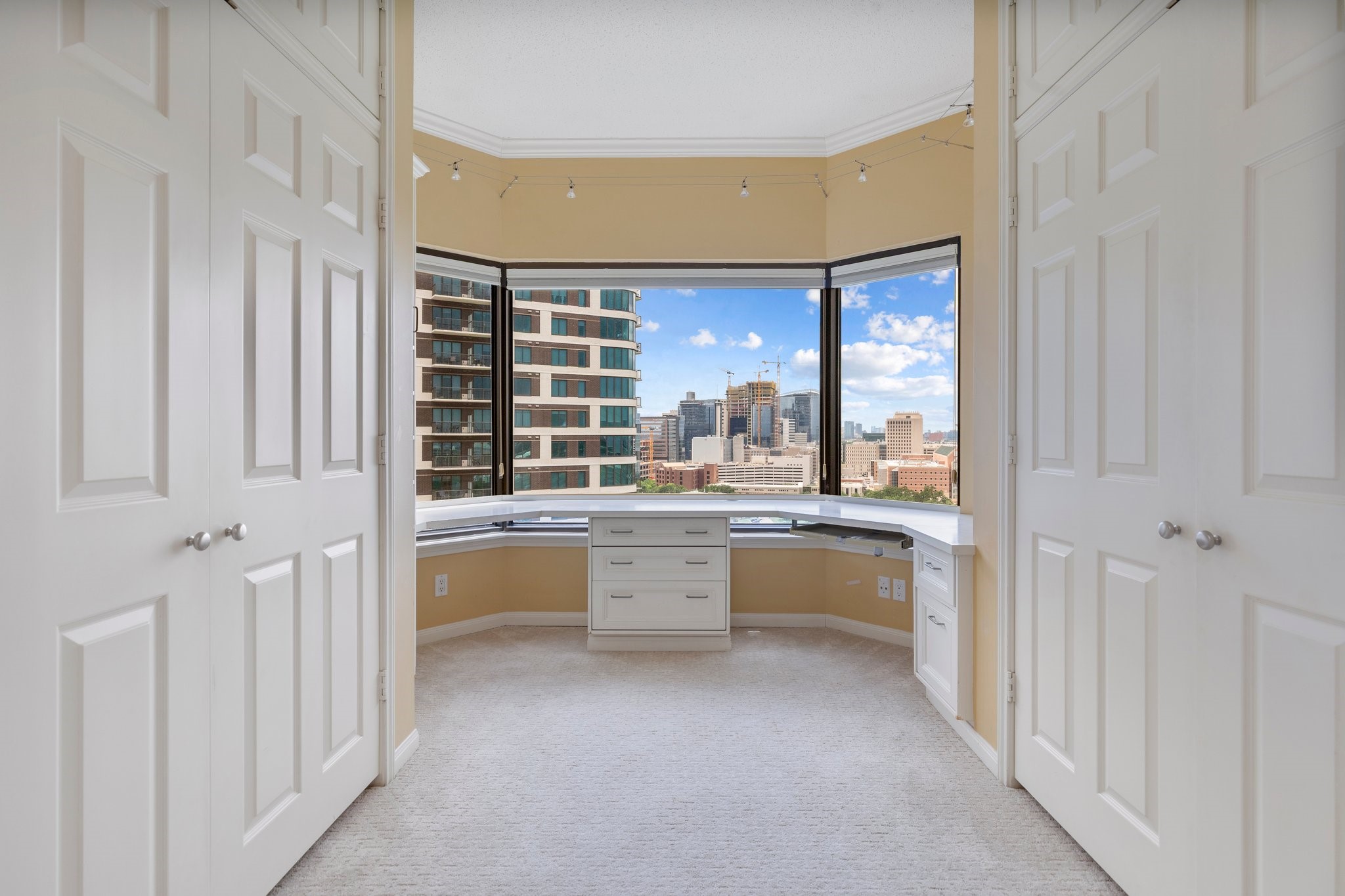 2001 Holcombe Boulevard, Unit 1801 Houston, TX 77030 - Photo 14 of 31 a large white room with a large window and chairs