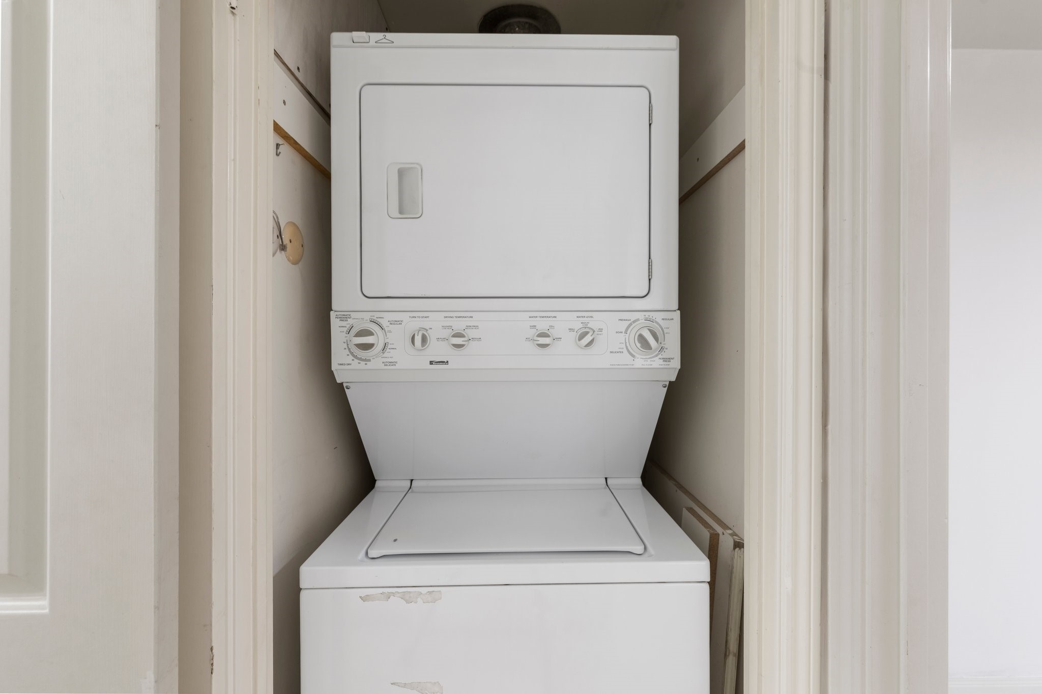 2001 Holcombe Boulevard, Unit 1801 Houston, TX 77030 - Photo 9 of 31 a utility room with dryer and washer