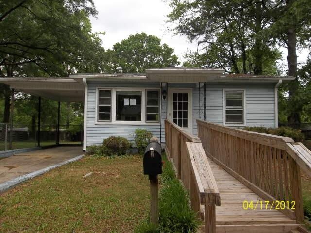 4 Johnson Street Rome, GA 30165 - Photo 1 of 1 a view of a house with a chairs in patio