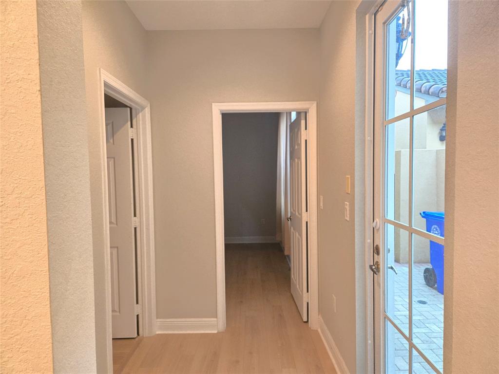 1528 Southwest 147th Avenue, Unit 1527 Pembroke Pines, FL 33027 - Photo 14 of 18 a view of an entryway with a livingroom