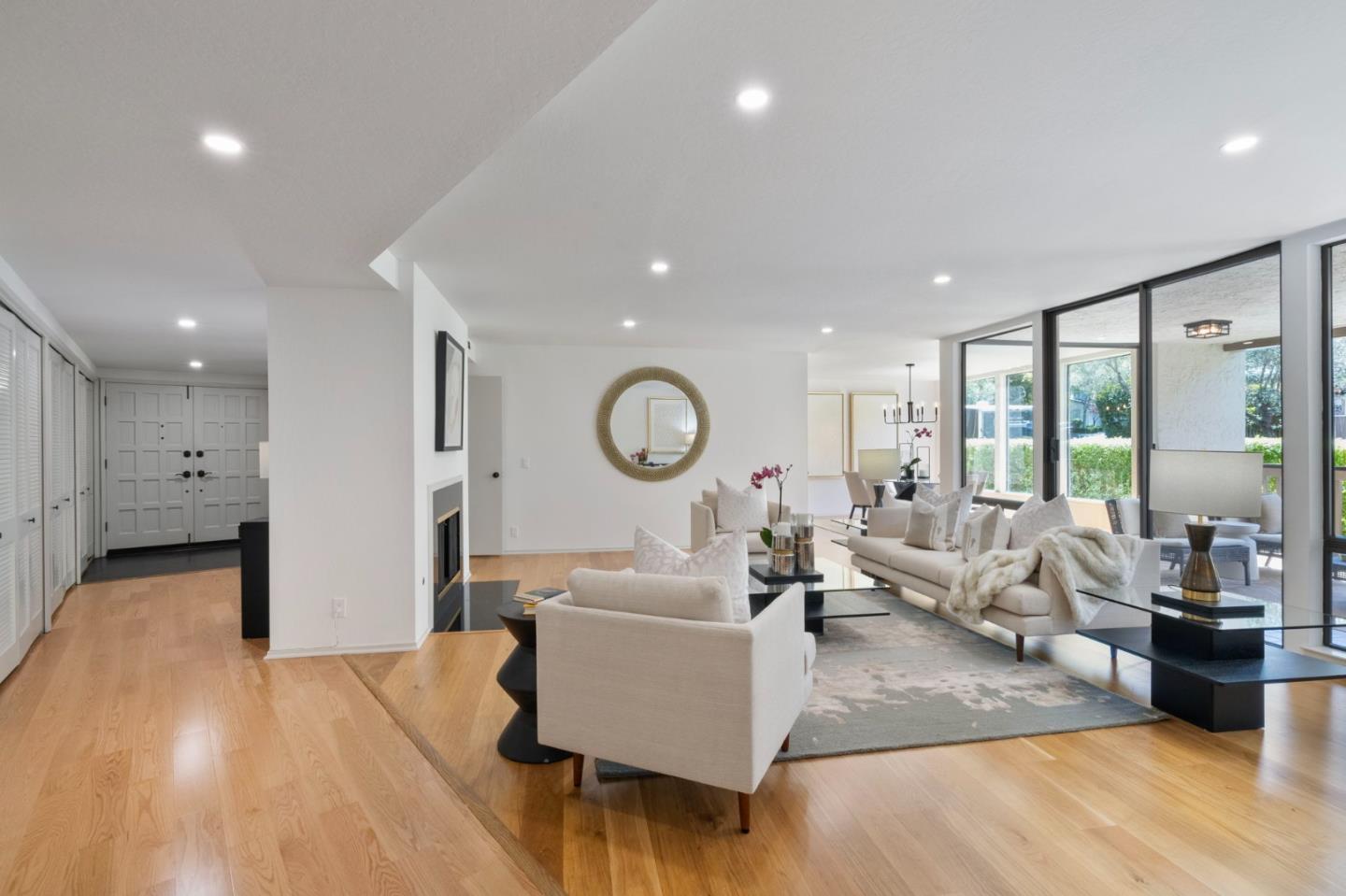 300 Sand Hill Circle, Unit 101 Menlo Park, CA 94025 - Photo 16 of 47 a living room with furniture and a large window