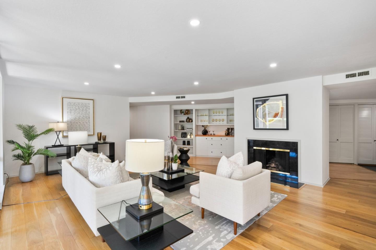 300 Sand Hill Circle, Unit 101 Menlo Park, CA 94025 - Photo 17 of 47 a living room with furniture fireplace and wooden floor