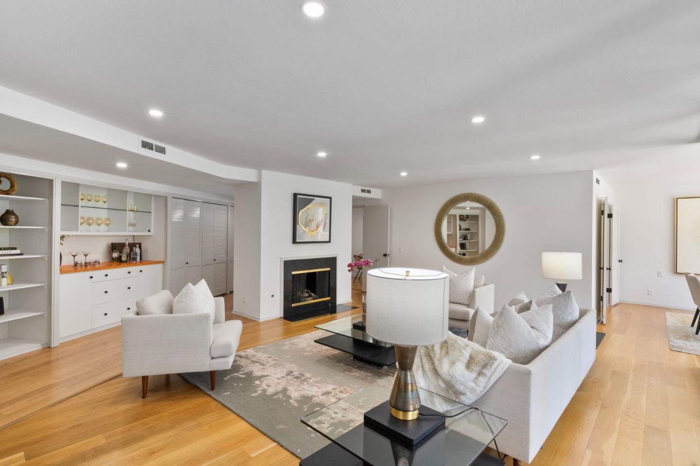 300 Sand Hill Circle, Unit 101 Menlo Park, CA 94025 - Photo 19 of 47 a living room with furniture a clock on wall and a window