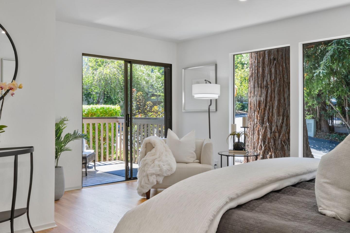 300 Sand Hill Circle, Unit 101 Menlo Park, CA 94025 - Photo 23 of 47 a bed room with a bed and a large window