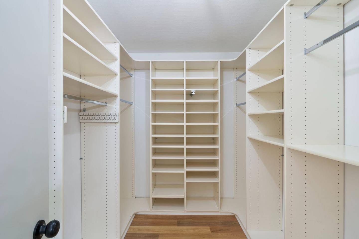 300 Sand Hill Circle, Unit 101 Menlo Park, CA 94025 - Photo 29 of 47 a view of walk in closet with empty racks