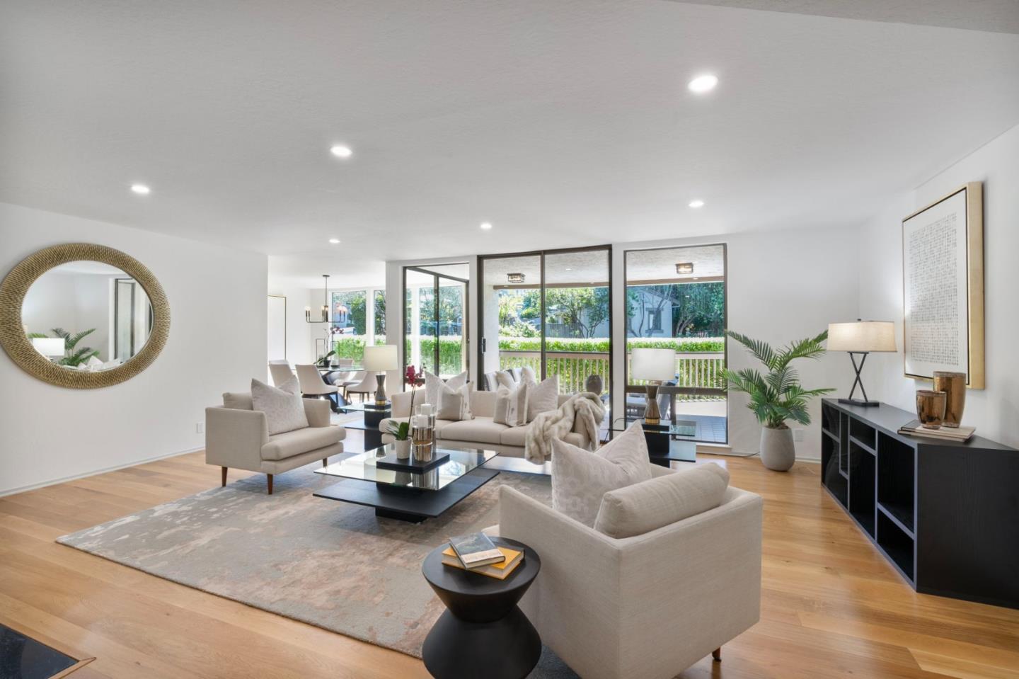 300 Sand Hill Circle, Unit 101 Menlo Park, CA 94025 - Photo 3 of 47 a living room with furniture and a large window