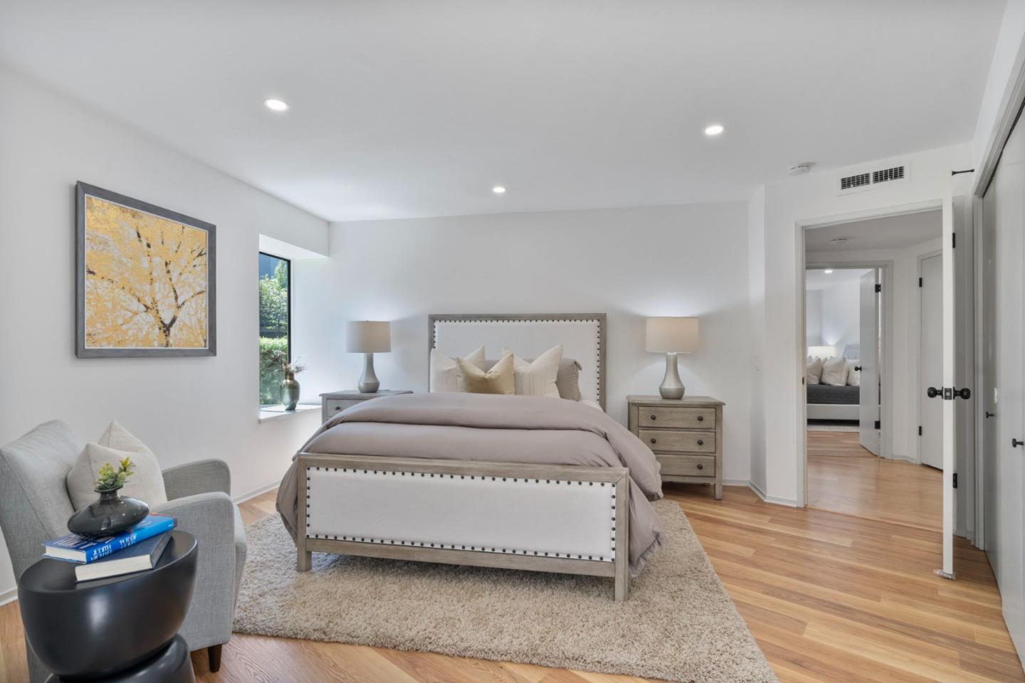 300 Sand Hill Circle, Unit 101 Menlo Park, CA 94025 - Photo 32 of 47 a bedroom with a bed and wooden floor