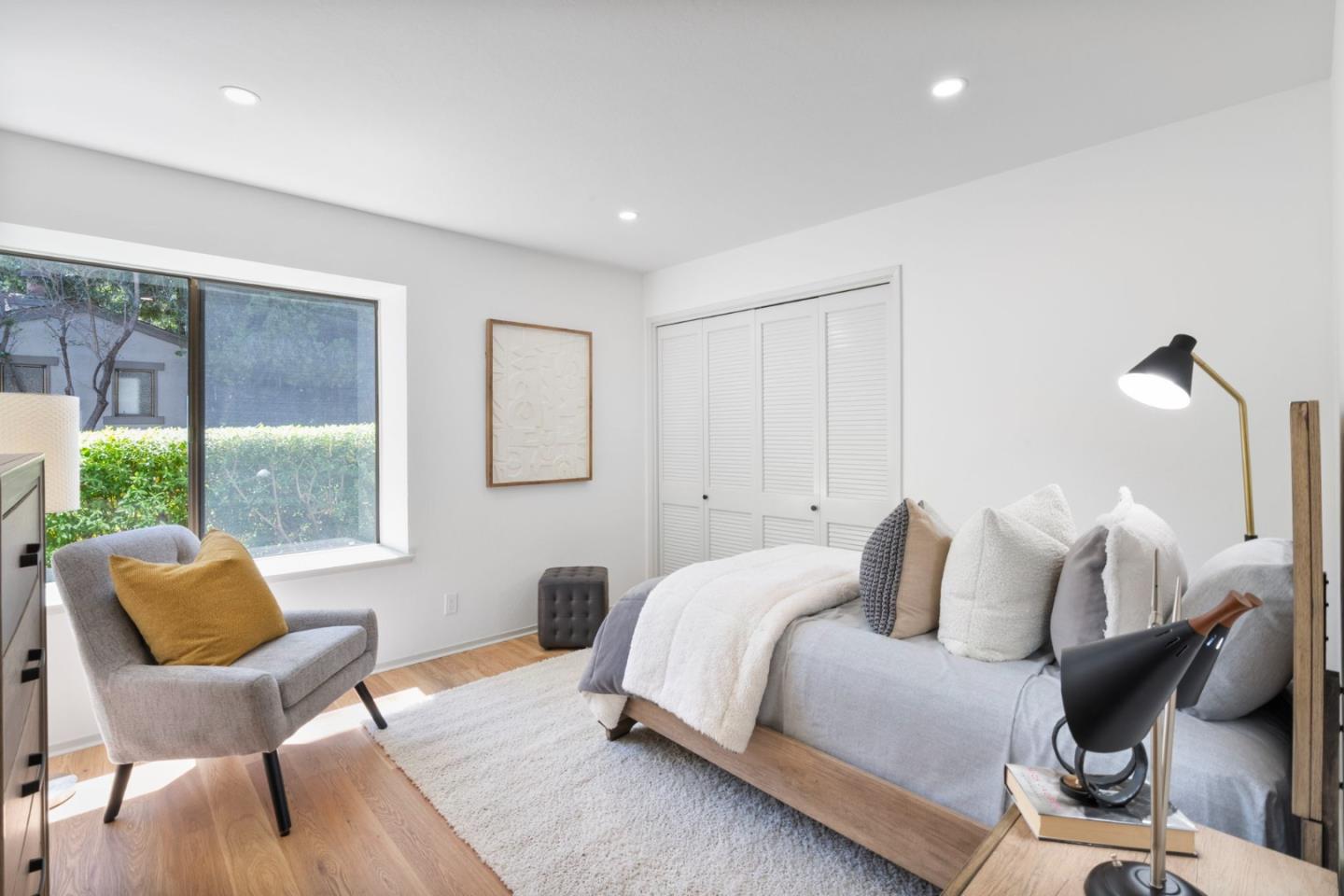 300 Sand Hill Circle, Unit 101 Menlo Park, CA 94025 - Photo 35 of 47 a bedroom with furniture and a large window