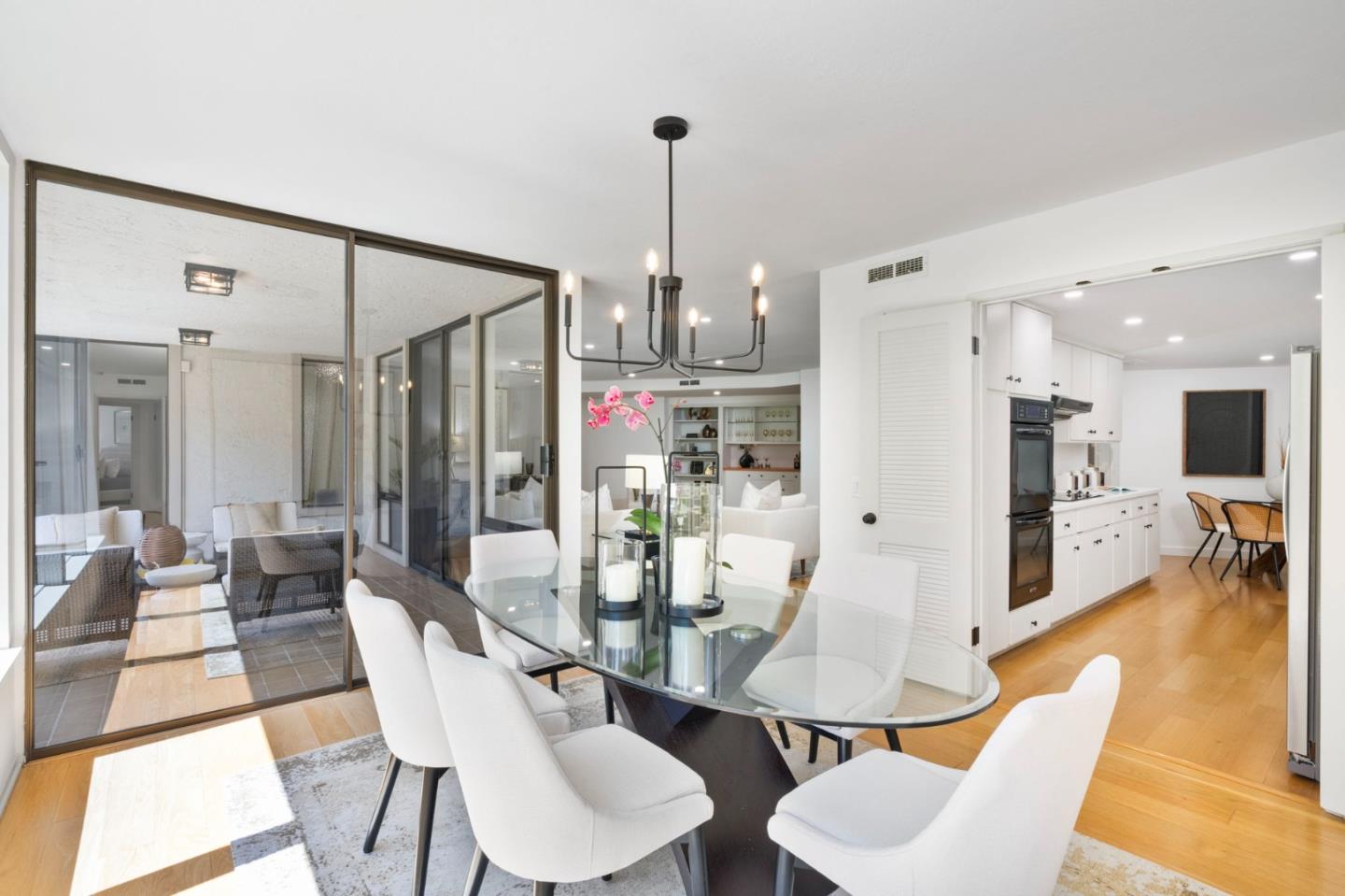 300 Sand Hill Circle, Unit 101 Menlo Park, CA 94025 - Photo 10 of 47 a view of a dining room and furniture window and wooden floor