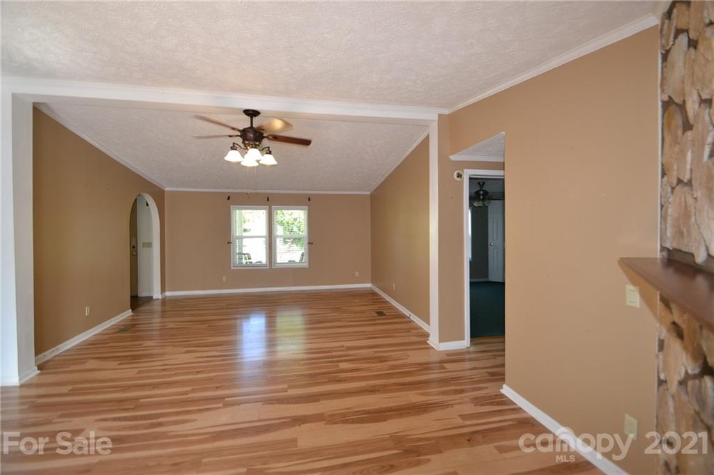 3511 Thunder Road Maiden, NC 28650 - Photo 11 of 44 a view of an empty room with window and wooden floor