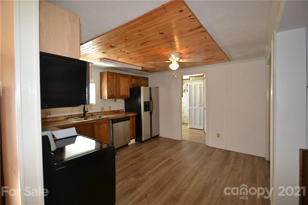 3511 Thunder Road Maiden, NC 28650 - Photo 20 of 44 a kitchen with a sink appliances and cabinets