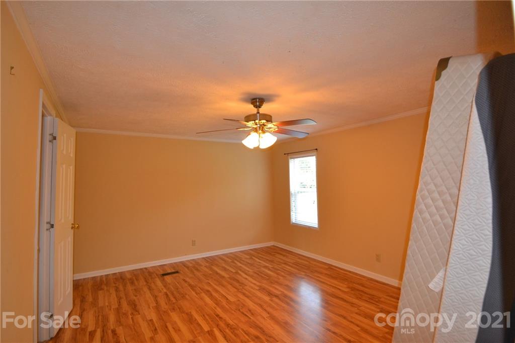 3511 Thunder Road Maiden, NC 28650 - Photo 22 of 44 a view of empty room with window and ceiling fan