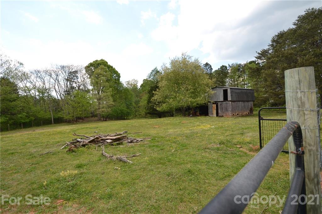 3511 Thunder Road Maiden, NC 28650 - Photo 41 of 44 a view of a lake with a yard