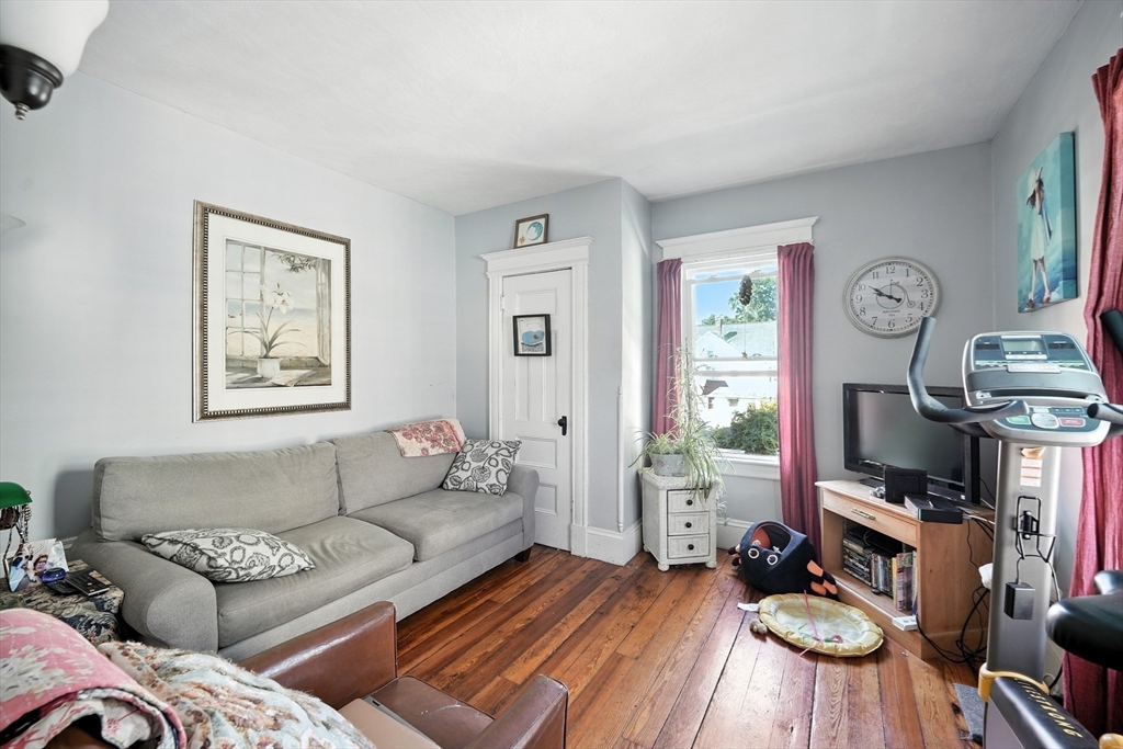 96 Firglade Avenue Springfield, MA 01108 - Photo 13 of 31 a living room with furniture and a window