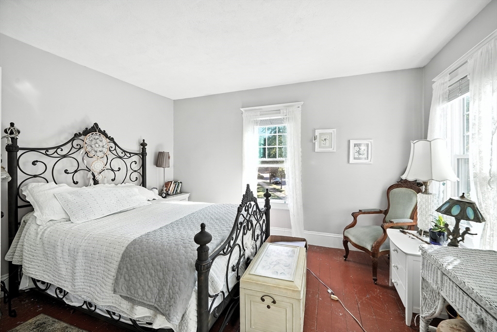 96 Firglade Avenue Springfield, MA 01108 - Photo 21 of 31 a bedroom with a bed and wooden floor