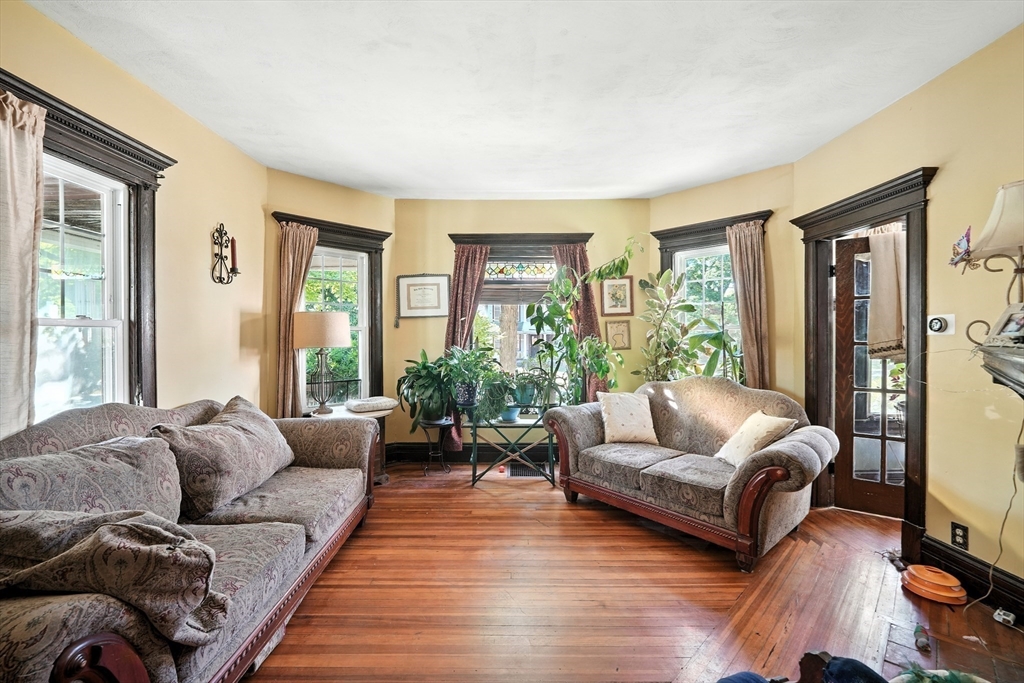 96 Firglade Avenue Springfield, MA 01108 - Photo 5 of 31 a living room with furniture and a large window