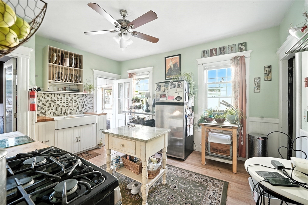 96 Firglade Avenue Springfield, MA 01108 - Photo 7 of 31 a kitchen with a table and chairs