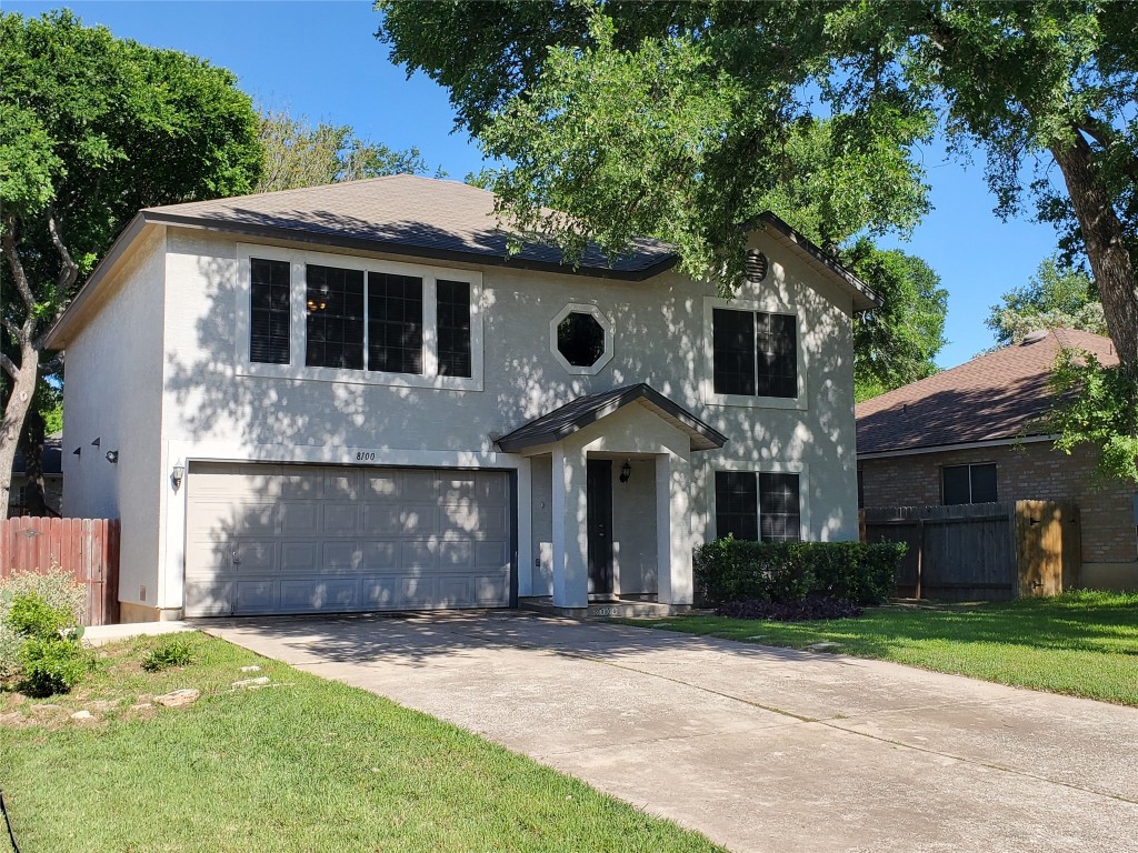 8100 Baxter Springs Road Austin, TX 78745 - Photo 1 of 1 a front view of a house with a garden
