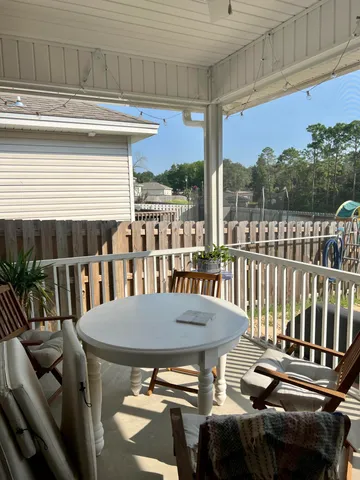 a view of a patio on the deck
