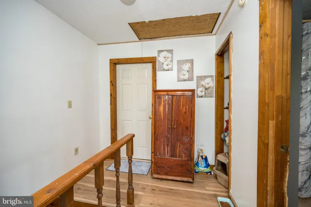 view of a bathroom with a sink and a mirror