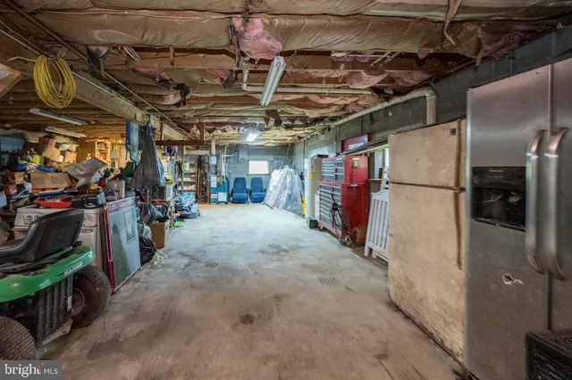 a view of a lake with houses in the background
