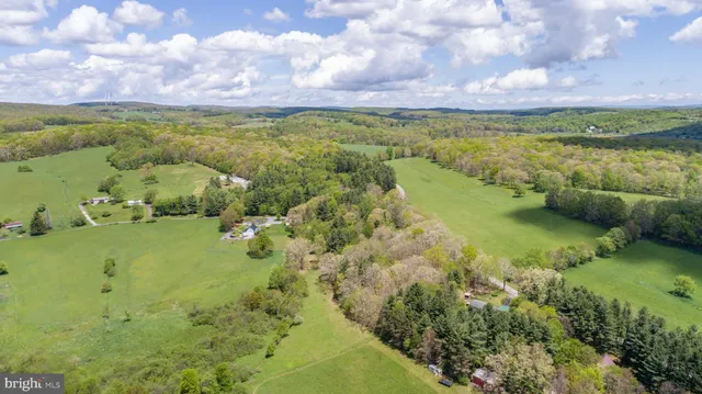 a view of a lake with a yard