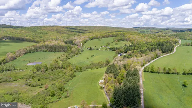 a view of lake with green space