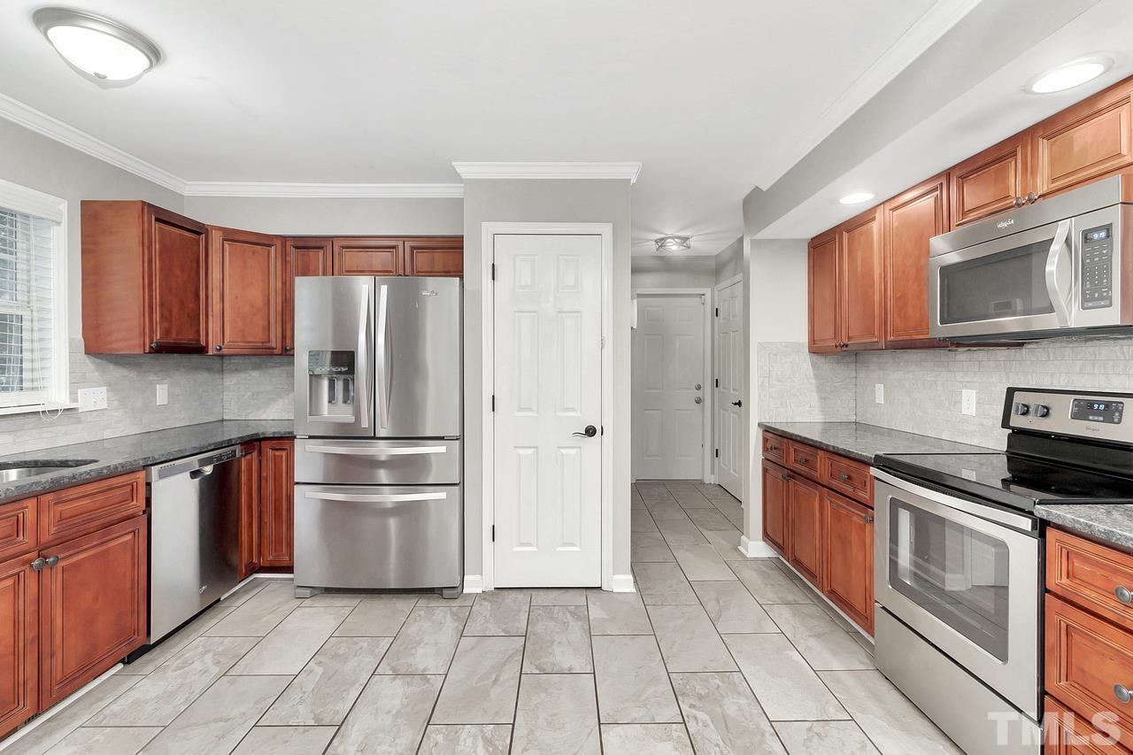 108 Stoneham Road Mebane, NC 27302 - Photo 4 of 11 Open concept kitchen with an easy flow