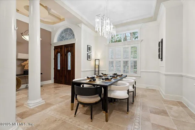 an outdoor space with furniture and potted plants