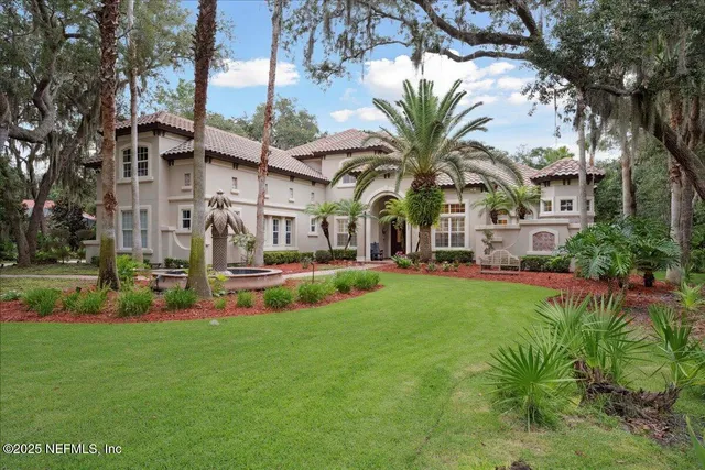 a view of backyard with outdoor seating
