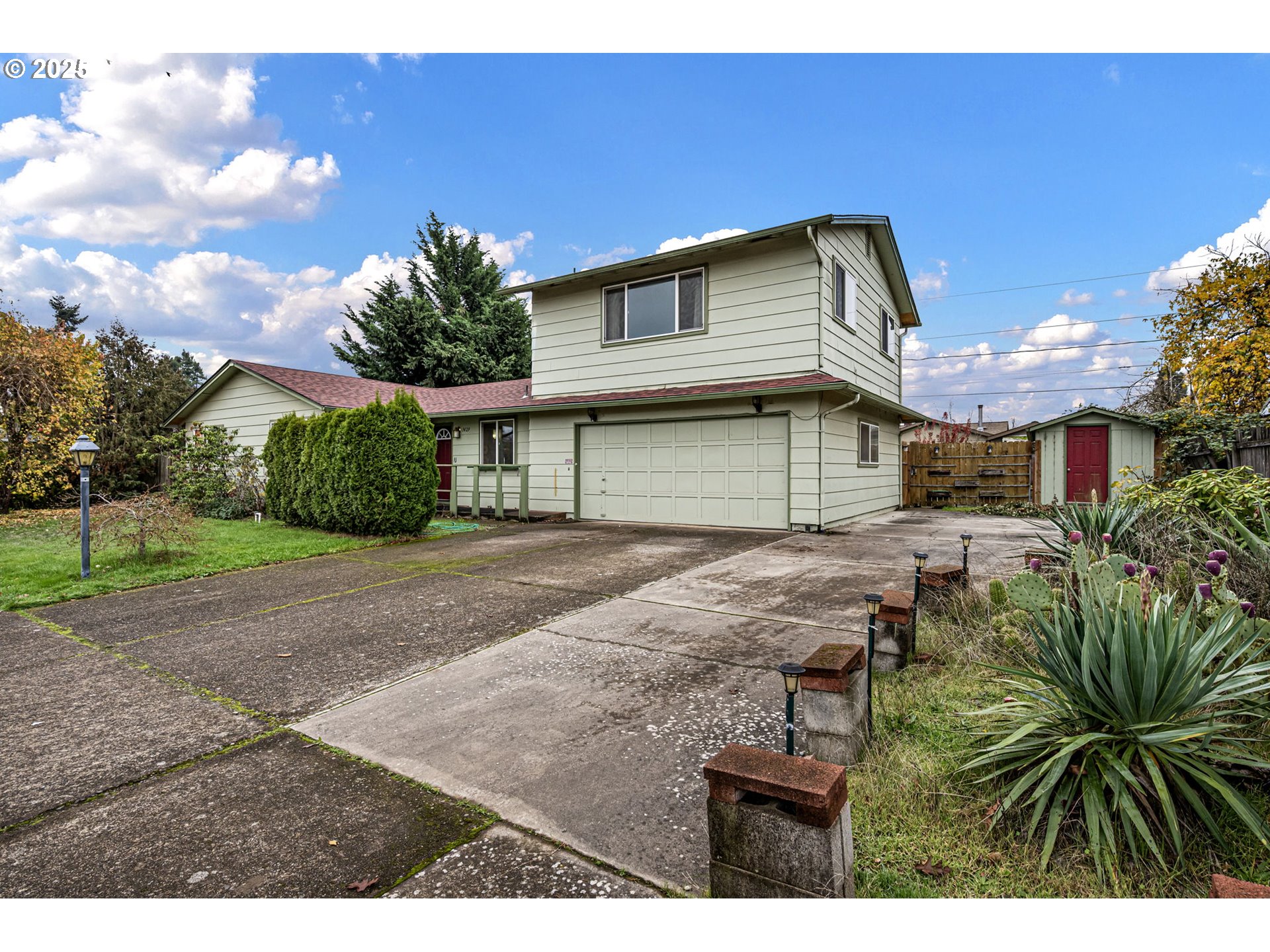 1429 Delrose Avenue Springfield, OR 97477 - Photo 1 of 21 a backyard of a house with lots of green space