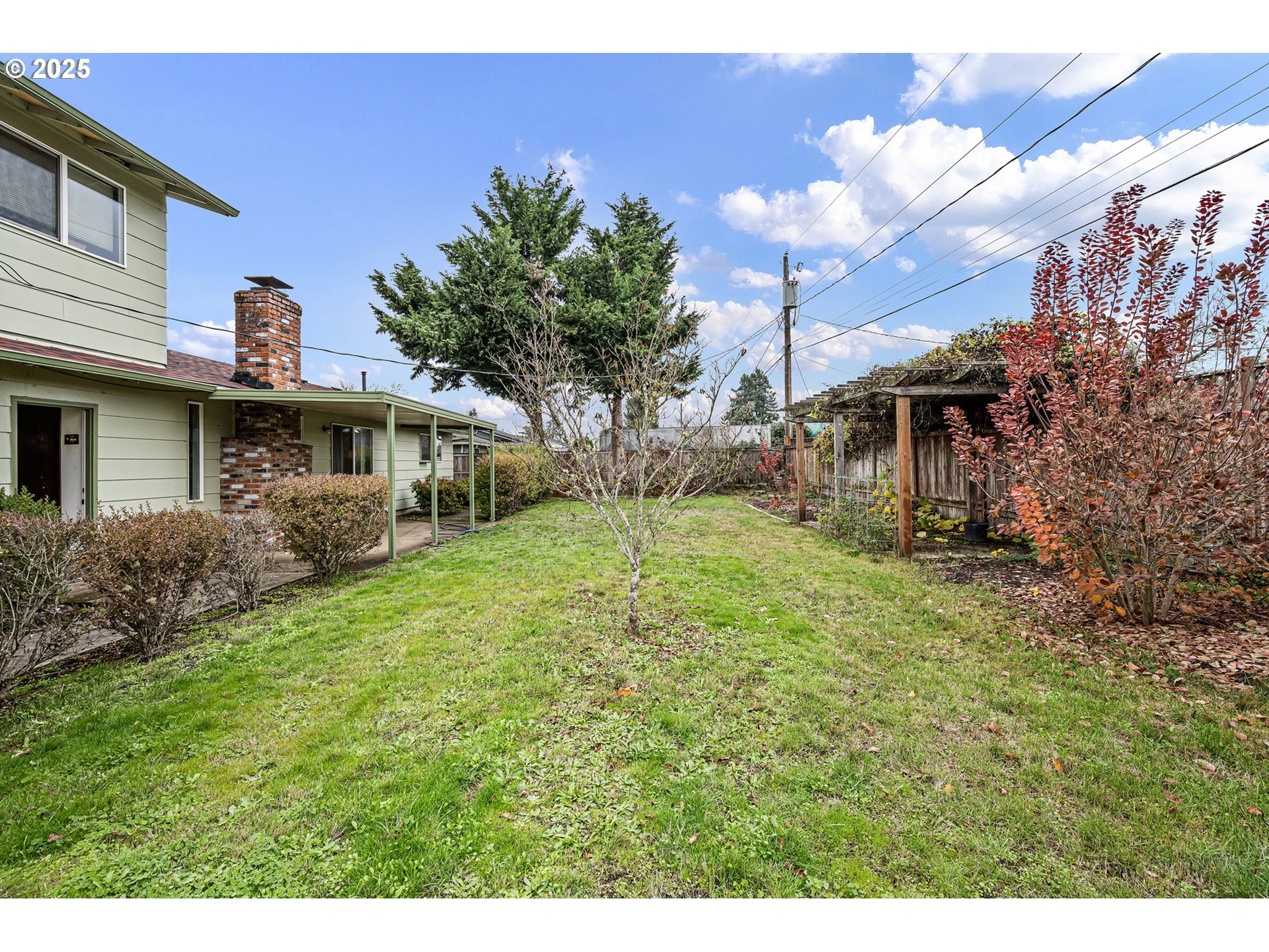 1429 Delrose Avenue Springfield, OR 97477 - Photo 14 of 21 a view of a house with a back yard