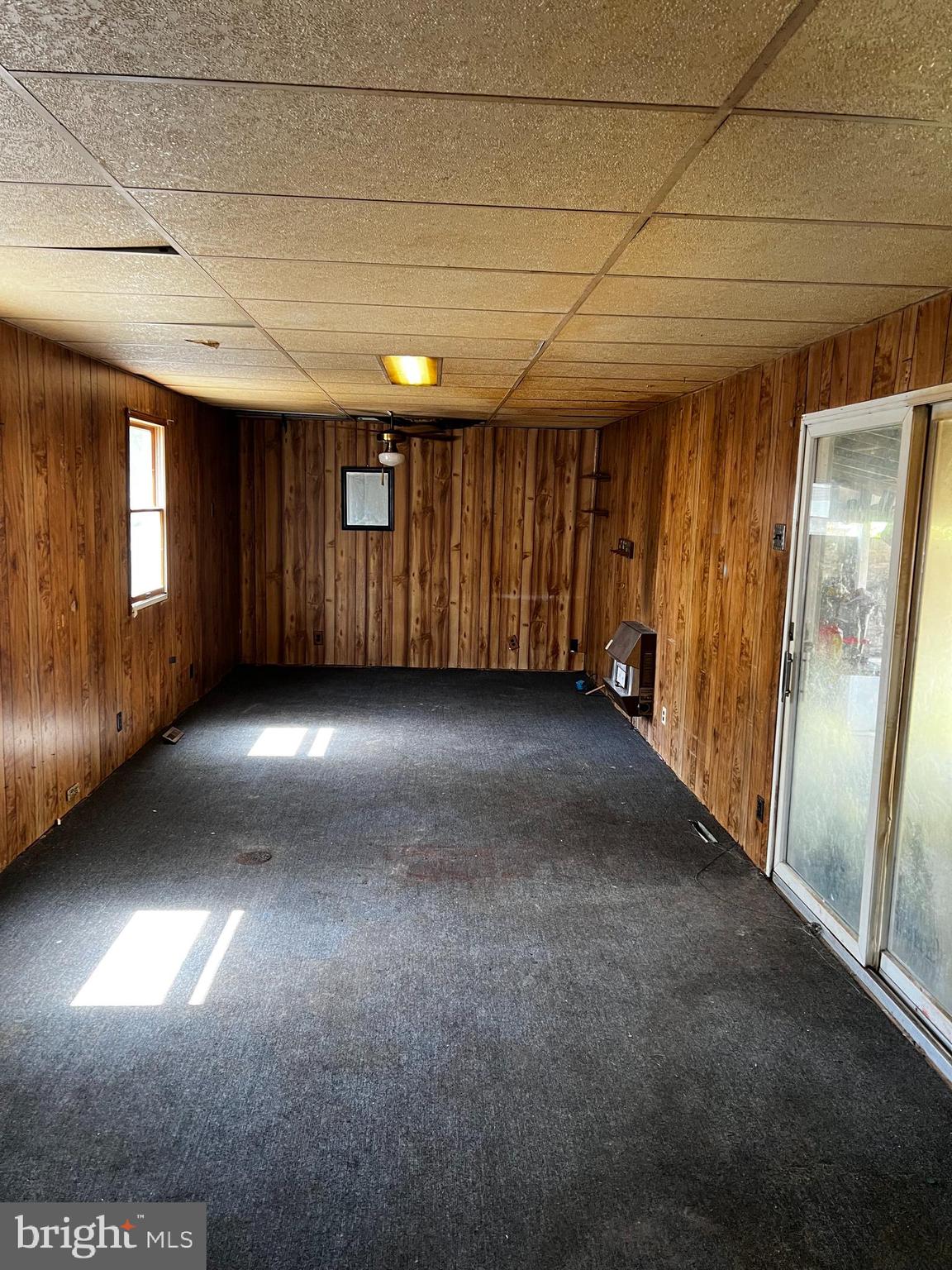 41 Churchtown Road Pennsville, NJ 08070 - Photo 6 of 20 an empty room with windows