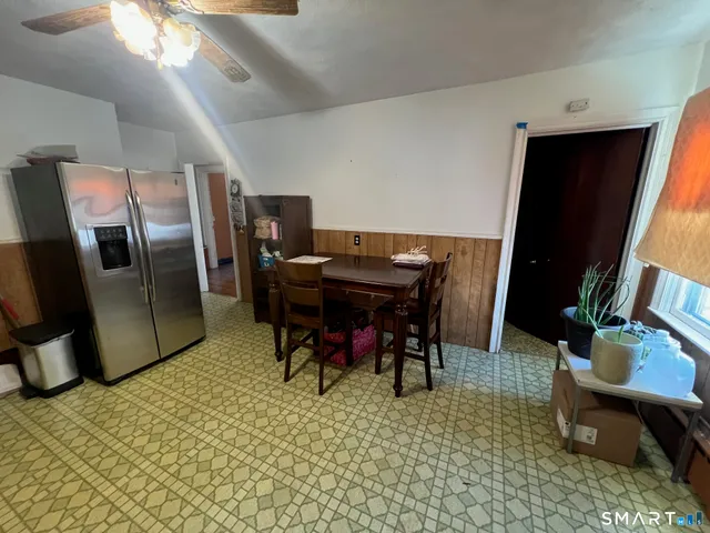 a view of a workspace with furniture