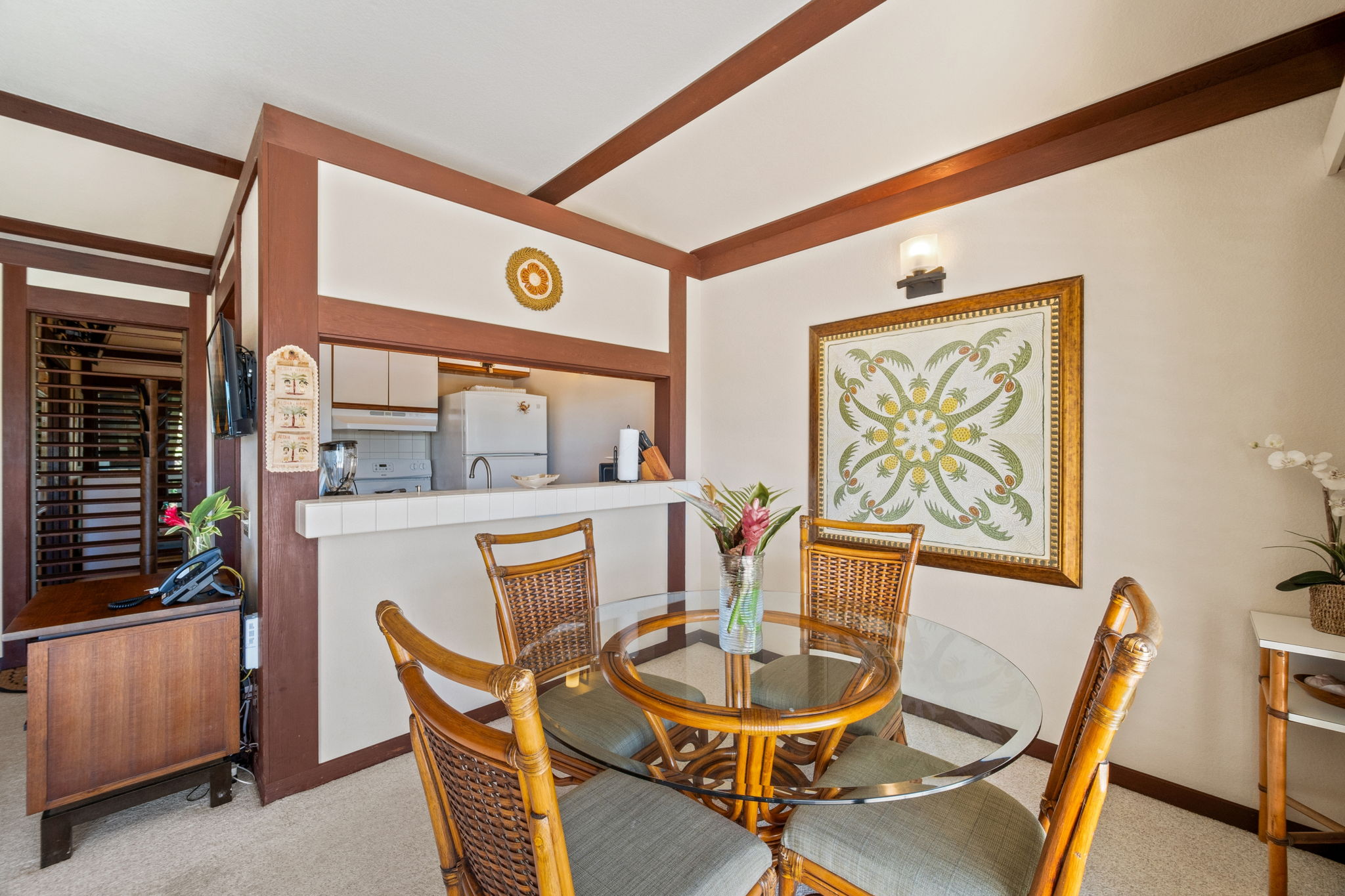 2253 Poipu Road, Unit 109 Koloa, HI 96756 - Photo 21 of 30 a dining room with furniture and window