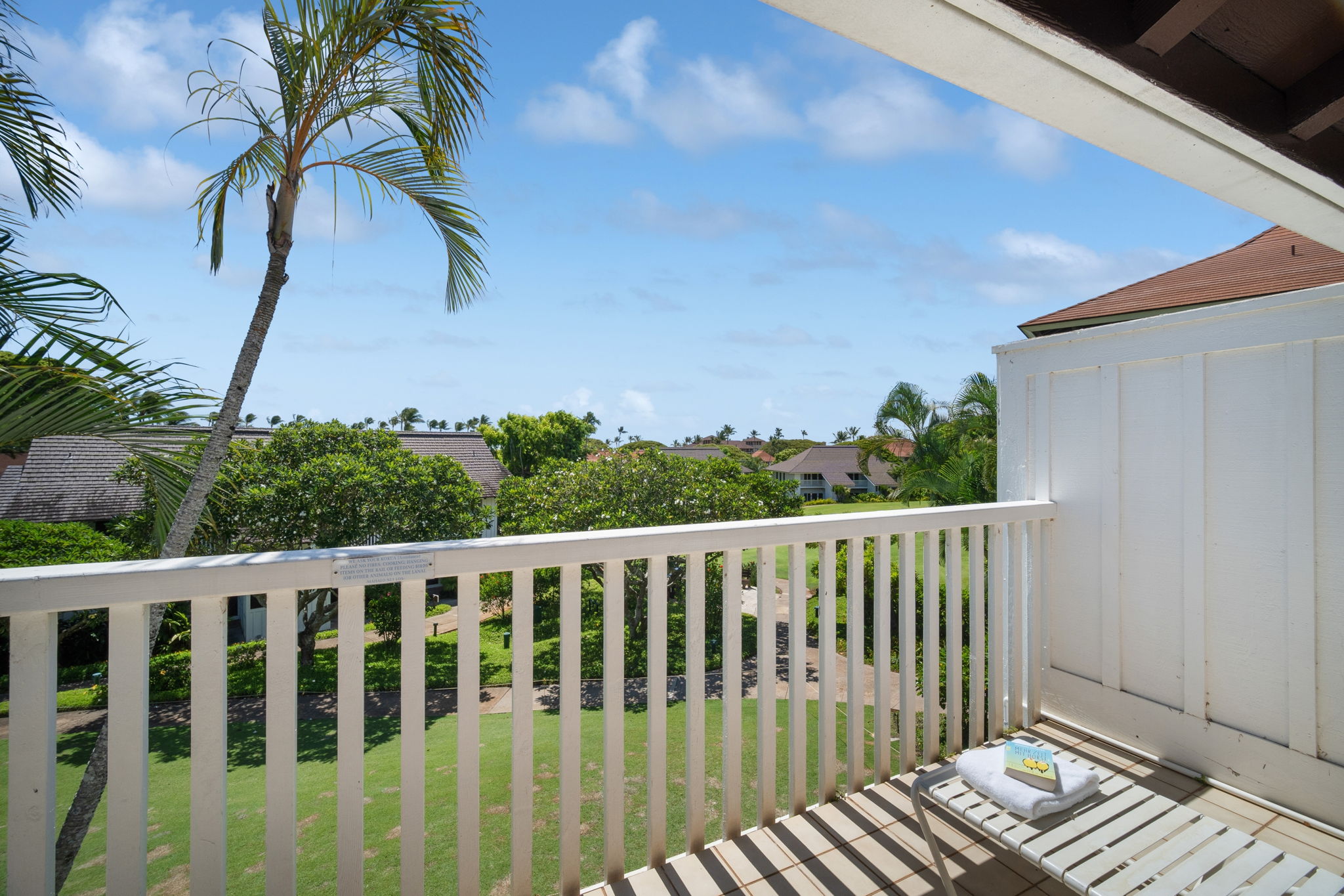 2253 Poipu Road, Unit 109 Koloa, HI 96756 - Photo 25 of 30 a view of balcony with wooden floor