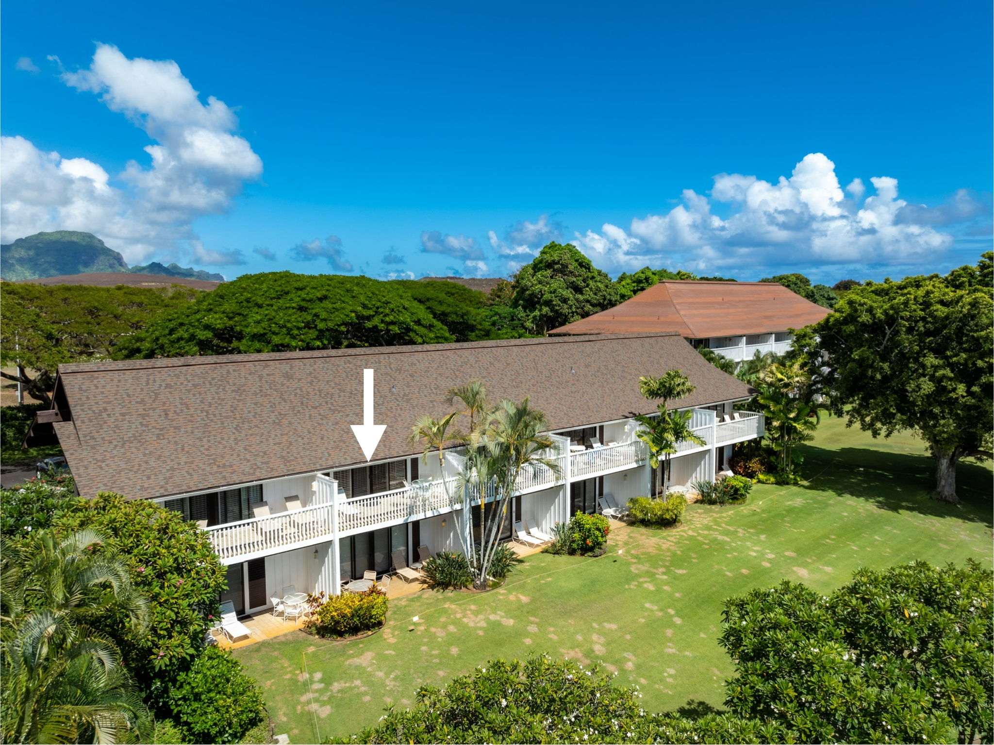 2253 Poipu Road, Unit 109 Koloa, HI 96756 - Photo 28 of 30 an aerial view of a house with a big yard