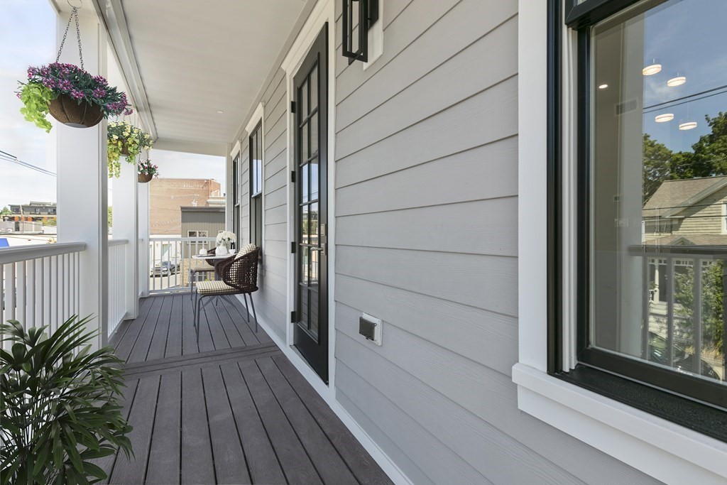 88 Dover Street, Unit 2 Somerville, MA 02144 - Photo 12 of 36 a view of a house with a balcony