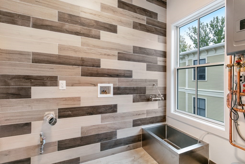 88 Dover Street, Unit 2 Somerville, MA 02144 - Photo 17 of 36 a view of a building with entryway