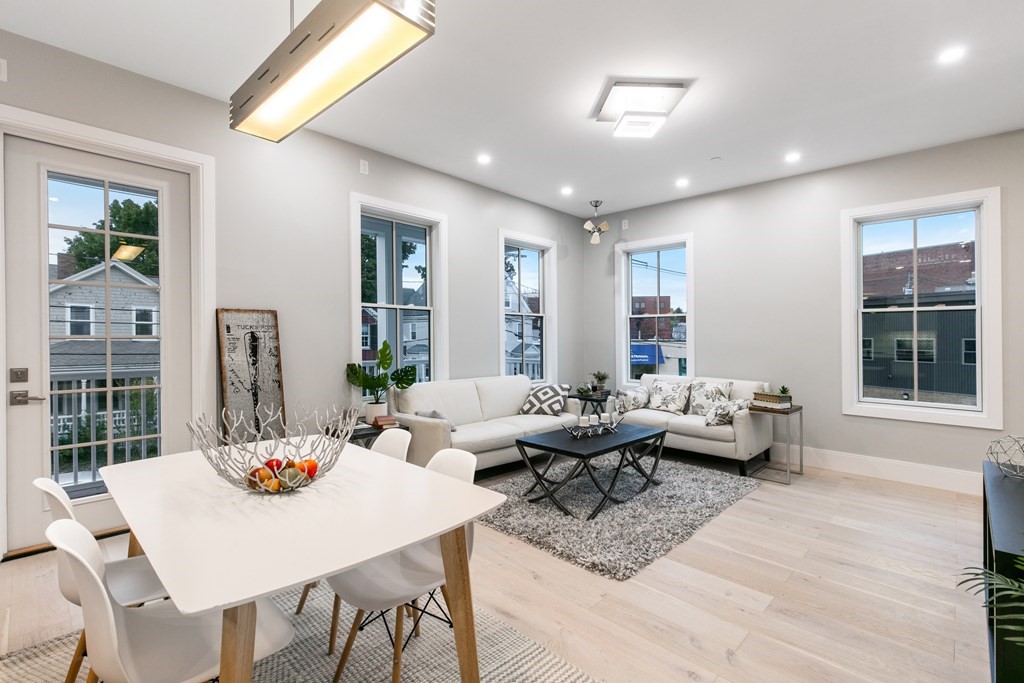 88 Dover Street, Unit 2 Somerville, MA 02144 - Photo 8 of 36 a living room with furniture window and wooden floor