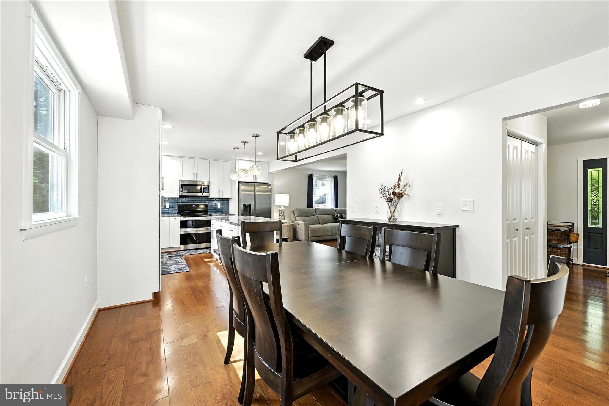 3111 Northwind Road Baltimore, MD 21234 - Photo 14 of 81 a view of a dining room with furniture and wooden floor