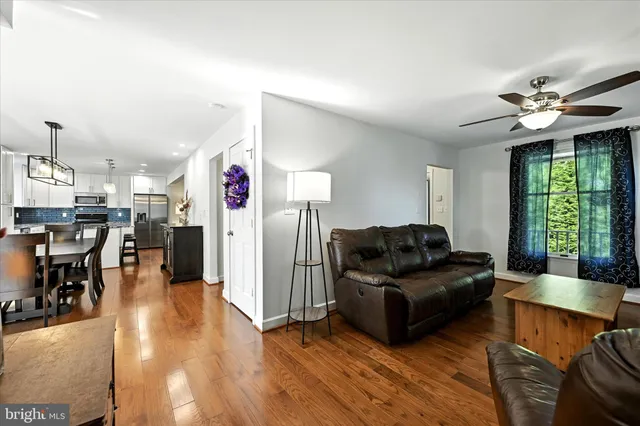 a bed room with a bed and a chandelier