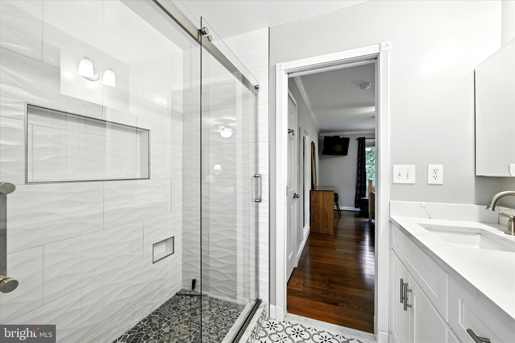 3111 Northwind Road Baltimore, MD 21234 - Photo 24 of 81 a bathroom with a sink and a mirror