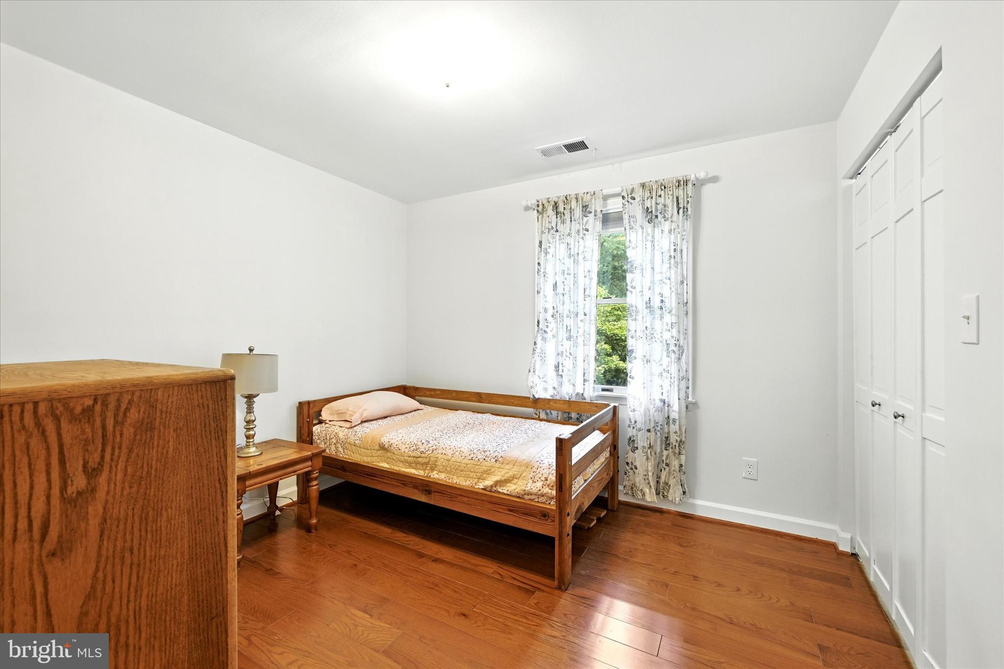 3111 Northwind Road Baltimore, MD 21234 - Photo 26 of 81 a bedroom with a bed and a window