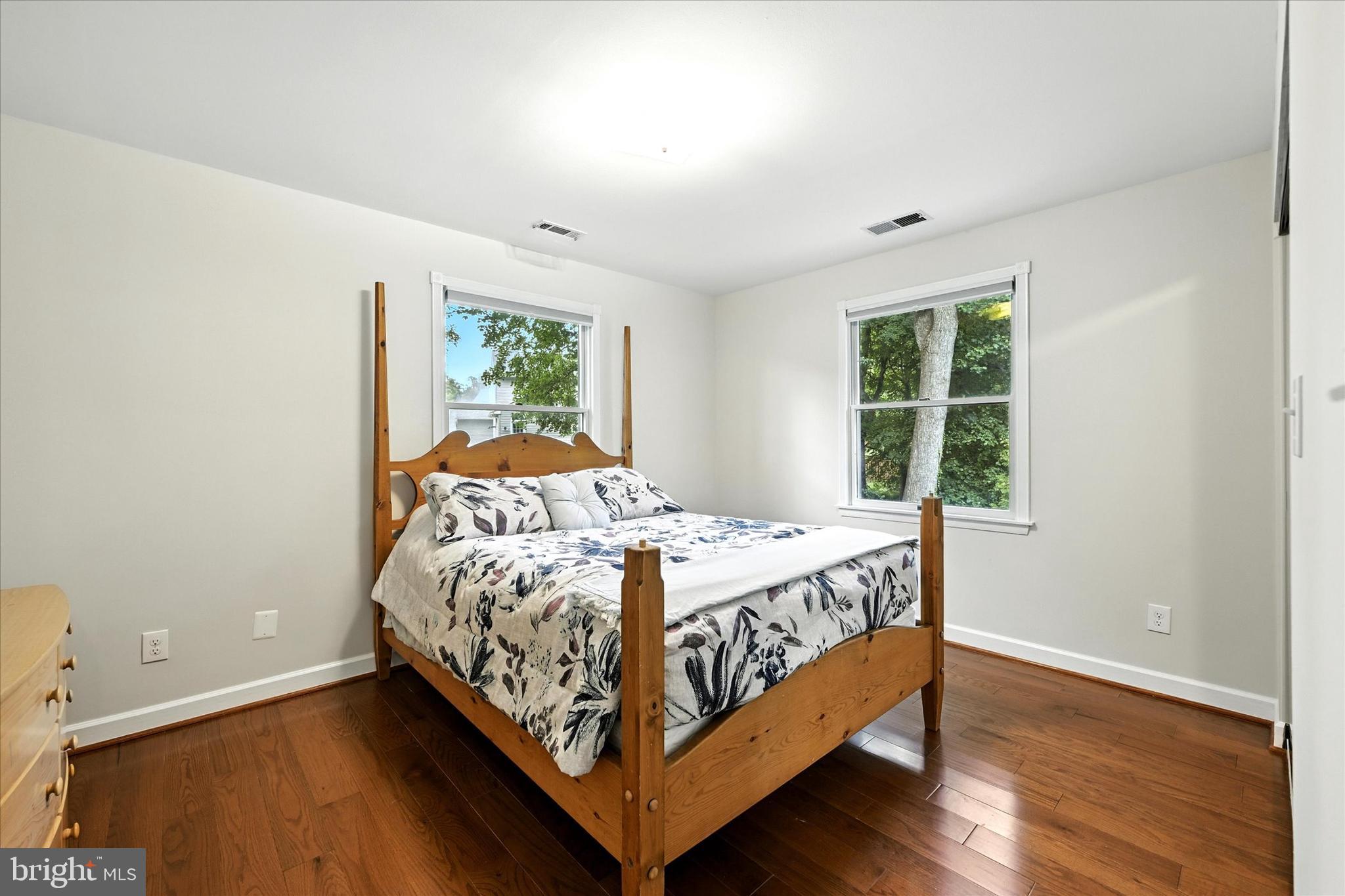 3111 Northwind Road Baltimore, MD 21234 - Photo 27 of 81 a bed sitting in a spacious bedroom next to a window