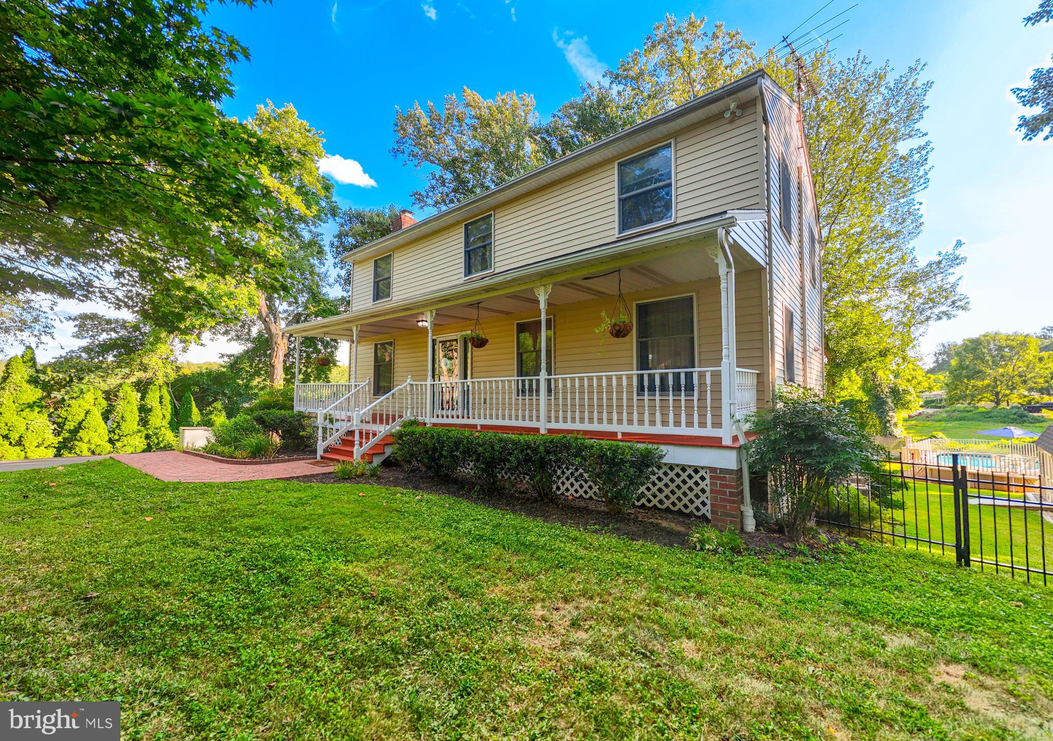 3111 Northwind Road Baltimore, MD 21234 - Photo 43 of 81 a view of a house with a yard and plants
