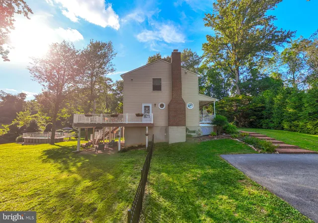 a view of a city with lush green forest